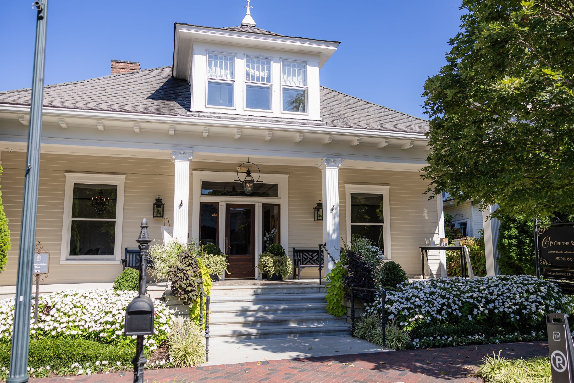 The front porch and gardens of CJ's Off the Square on a bright fall morning in Franklin, Tennessee
