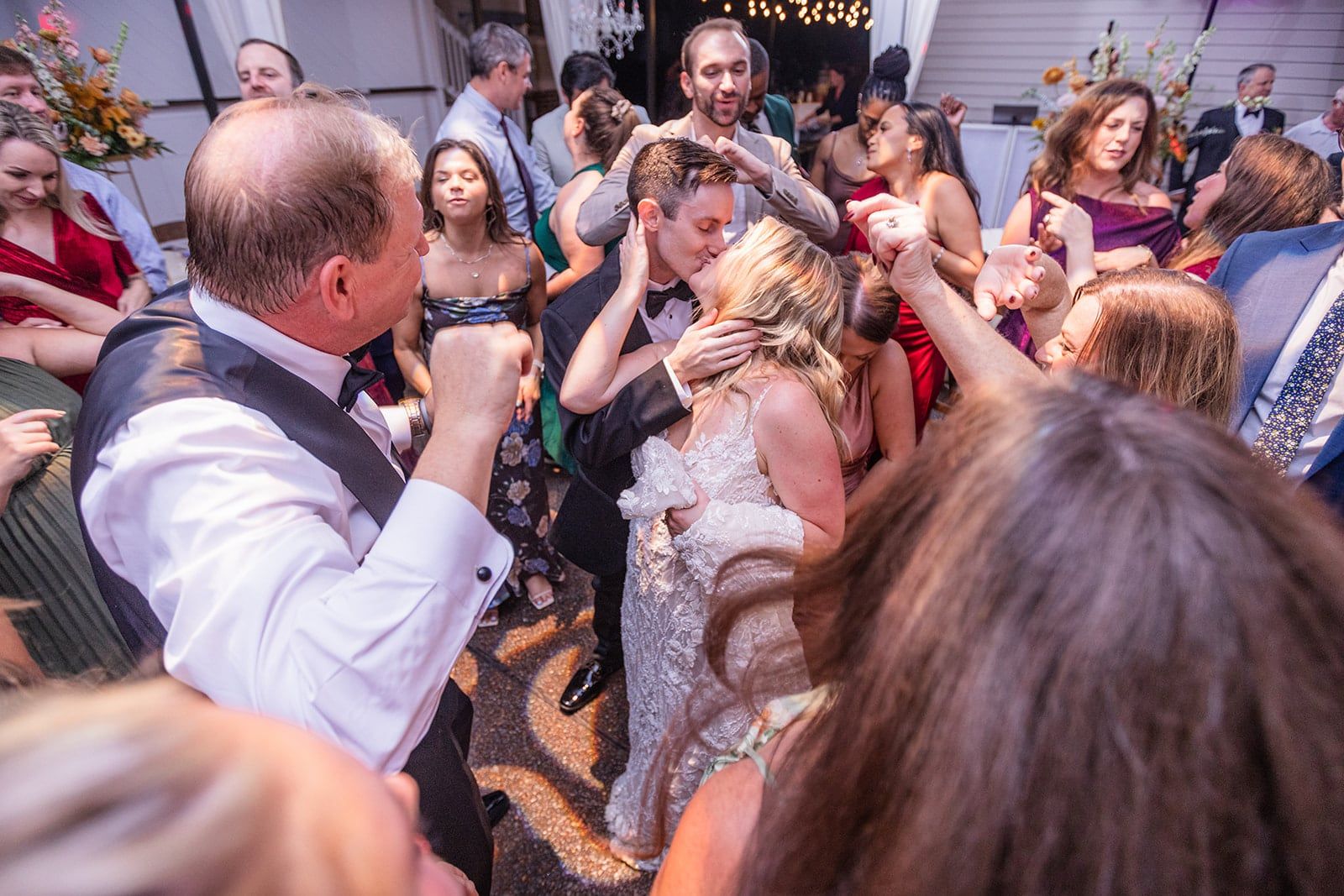 Caitlin dances with friends and family on a packed floor late into the night