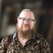 Micah, lead photographer, with his cameras on a shoulder harness