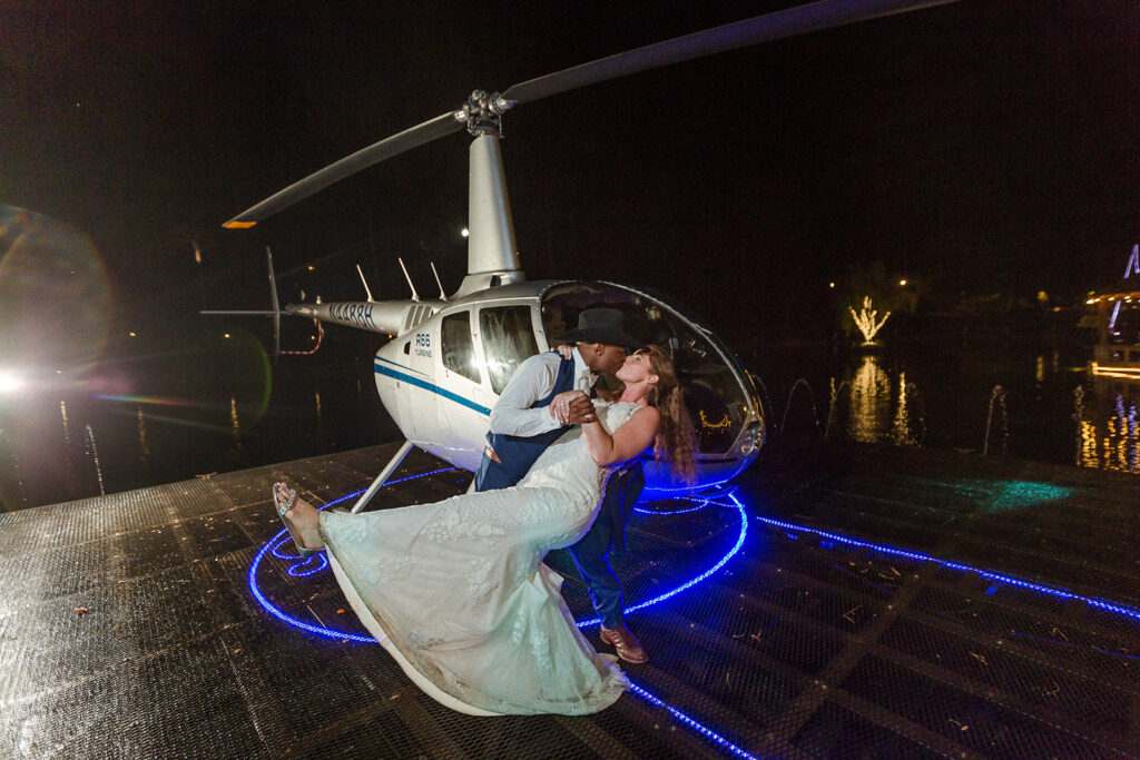 a luxury grand exit in a helicopter, bride and groom leave their Nashville  wedding in dramatic style