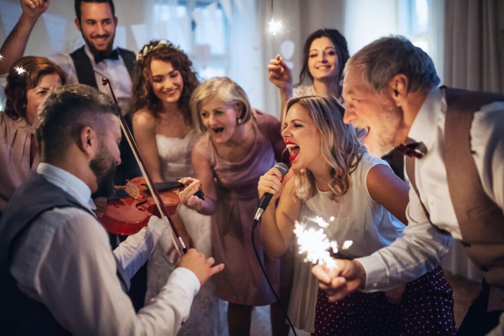 maid of honor Lindsey sings in a  photo captured in Nashville by affordable photographer Brian 