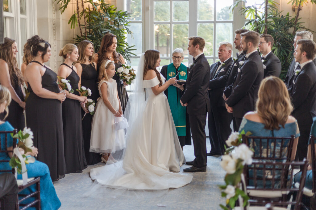 bride Shelby and groom Reid say their vows at the Nashville wedding, captured by their photographer