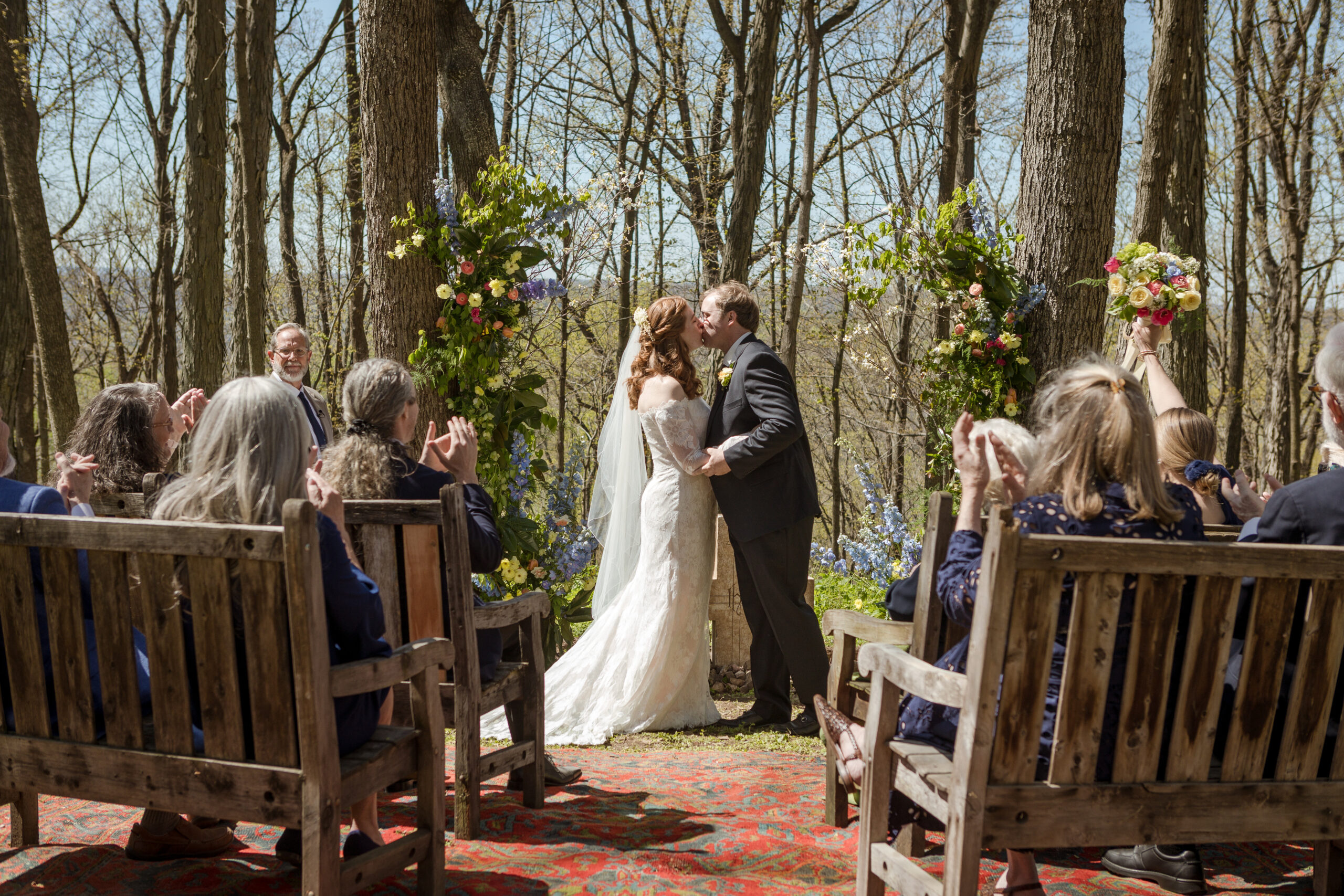 Bride Mamie and groom Will share a kiss during their micro wedding in Nashville.