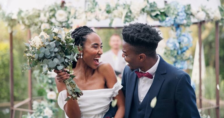 A cute bride and groom smile after their vows at their Nashville wedding.