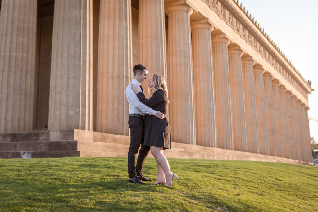 This engaged bride and groom enjoyed their photo shoot in Nashville at The Parthenon, with their affordable photographers capturing every moment.