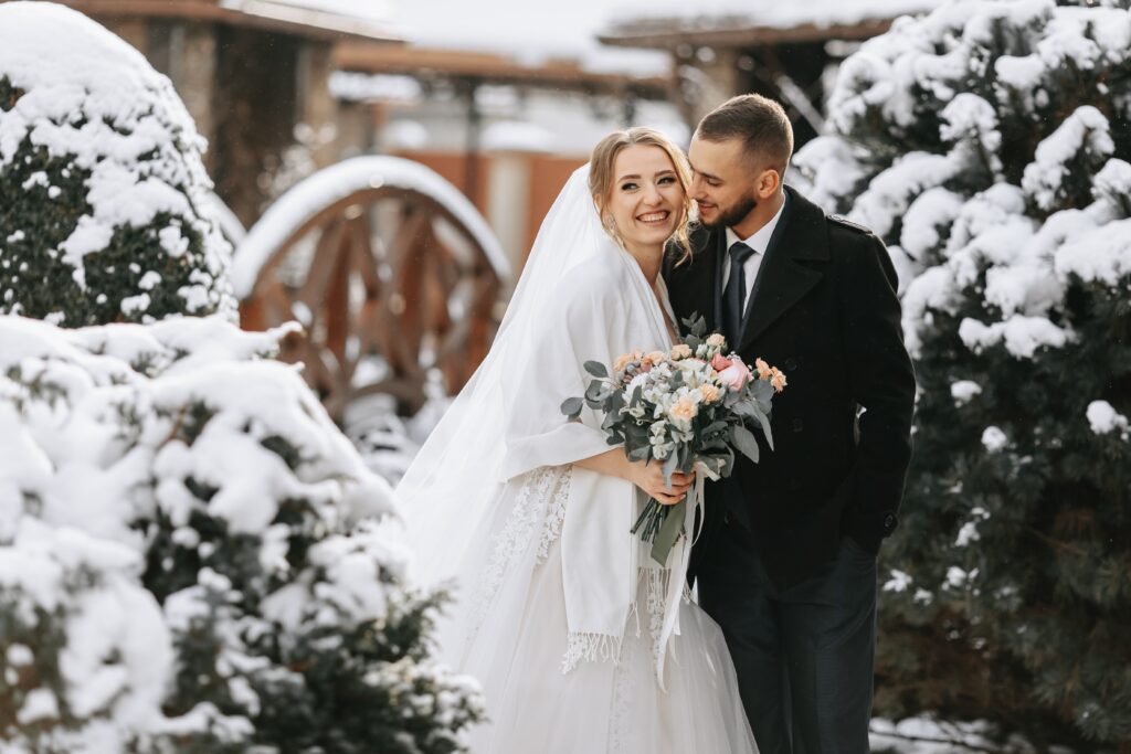 Newlyweds Jade and Rob share and intimate moments with their Nashville wedding photographers in the winter snow.