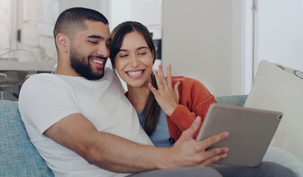 A newly engagement Nashville couple  announces to good news over FaceTime to family and friends.