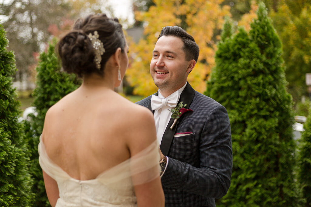 Groom David gets emotional during his first look with his bride Kathleen, as captured by the best wedding videographers in Nashville.